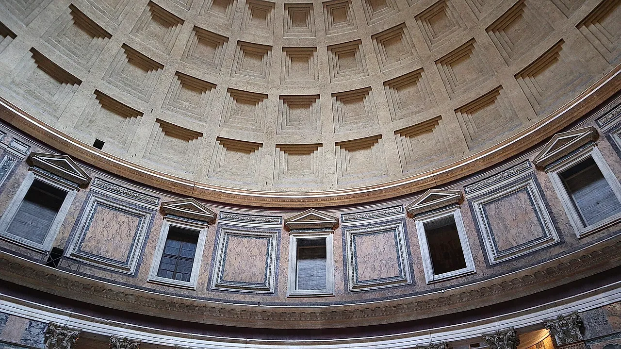 The Pantheon dome seen from inside: the coffered ceiling in concentric rows above the rectangular windows of the drum