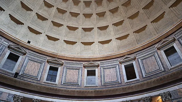 The Pantheon dome seen from inside: the coffered ceiling in concentric rows above the rectangular windows of the drum