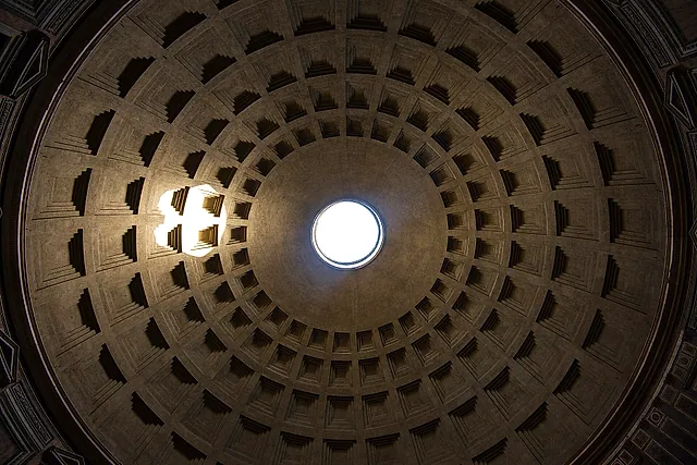 The oculus of the dome seen from below: light enters through the round opening and falls on part of the coffered ceiling