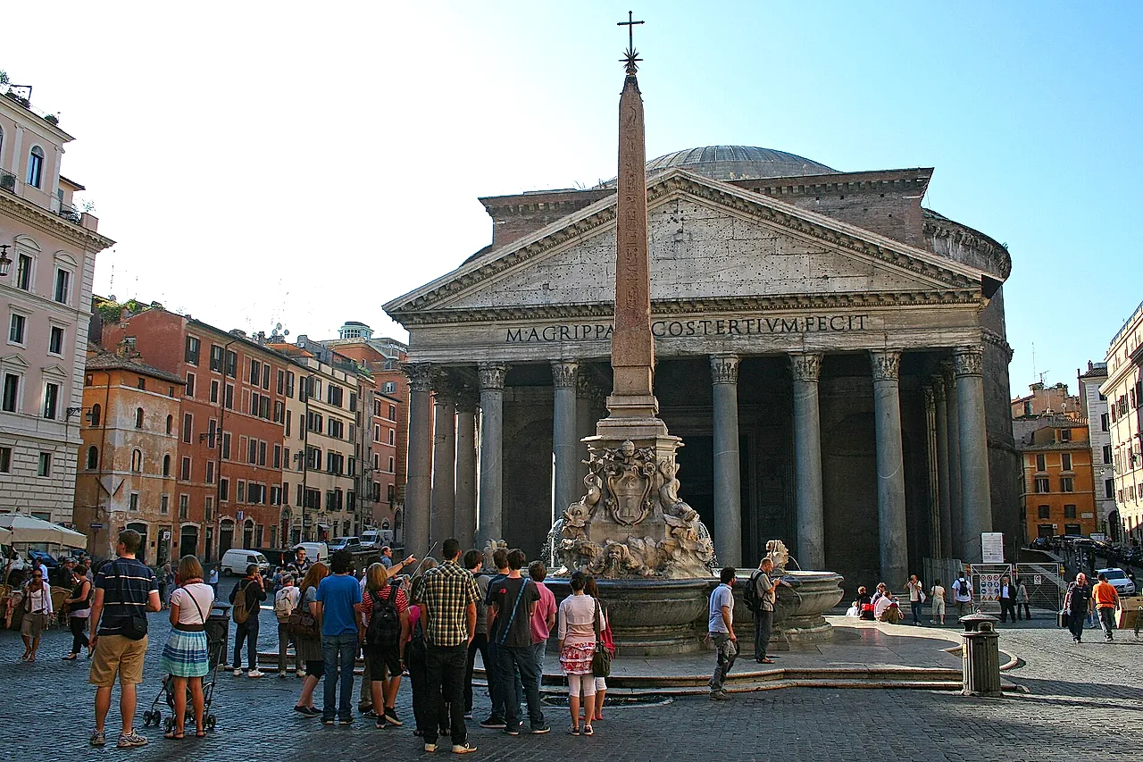 The obelisk and the fountain in the Piazza della Rotonda, in front of the Pantheon, with the square full of visitors